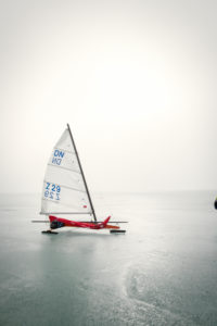 Ice sailing European championship on Lake Balaton in Hungary, the participants prepare the ice sailors for the regatta in the morning. The ice sailor is up and ready to sail with spare sail if the wind changes during the day Ice sailing European championship on Lake Balaton in Hungary, the participants prepare the ice sailors for the regatta in the morning. The ice sailor is up and ready to sail with spare sail if the wind changes during the day